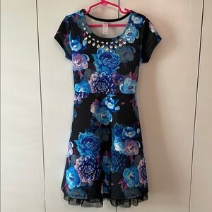S-O-L-D. 
Justice Black and Blue Floral Dress